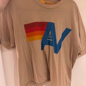 Aviator Nation Tan Tee with Blue Logo and Red-Orange-Yellow Stripes